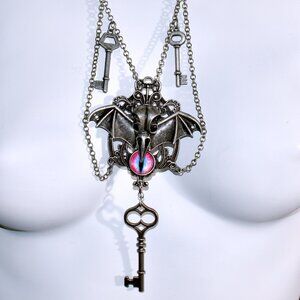 Handmade Gothic Chandelier Necklace with dragon eye, bat wings and bird skull